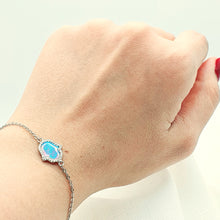Load image into Gallery viewer, Created Blue Opal Hamsa Hand Bracelet, Sterling Silvet
